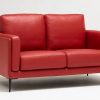 Red leather sofa made in France