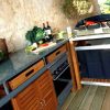 Designer Scandinavian kitchen teak and stainless steel