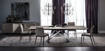 Extendable dining table designed by Andrea Lucatello