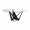 Round modern dining table in glass