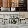 Round dining table designed by Andrea Lucatello