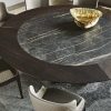 Modern round dining table in ceramic and wood