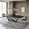 Luxurious solid wood dining table by Andrea Lucatello