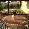 Mosaic and wrought iron tables